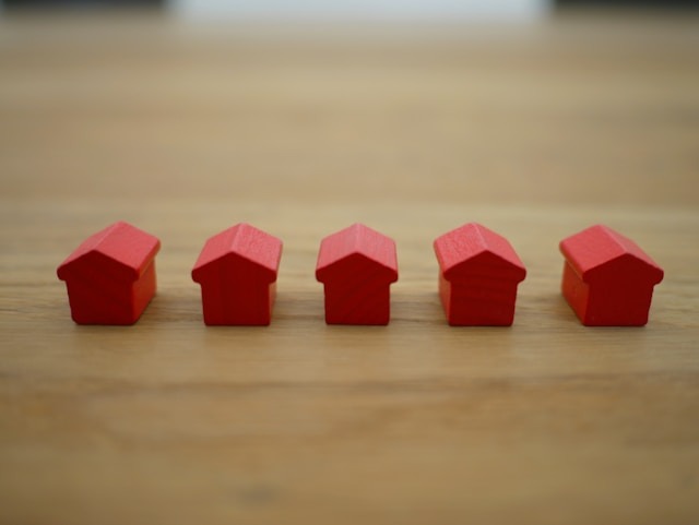 An individual making an investment - How to Build Credit